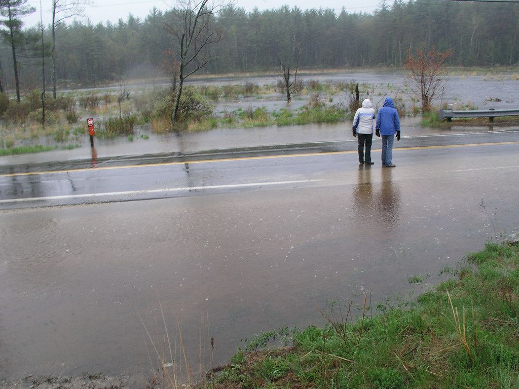 Flood waters are covering the road. Rt. 27, Whitehall Rd.