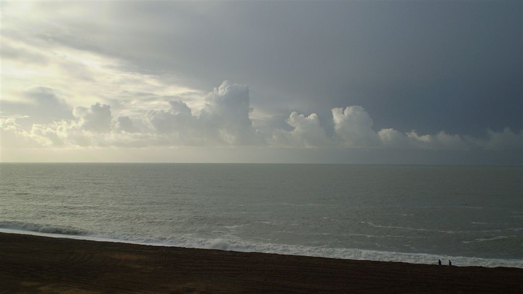 Calm sea stormy sky