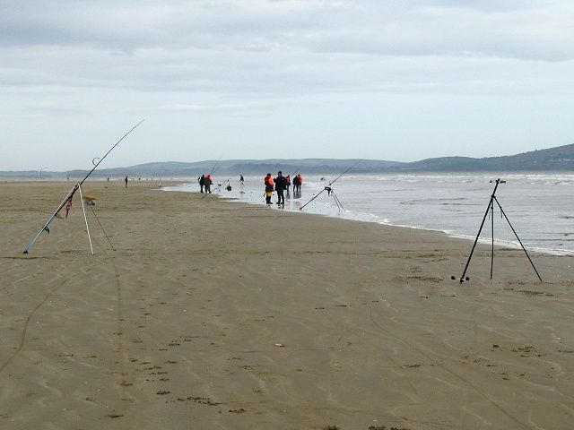Fishing on Cefn Sidan beach