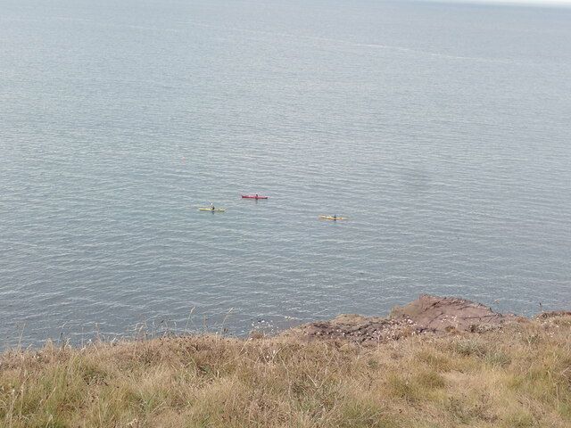 Kayakers off Nab's Head in St Bride's Bay