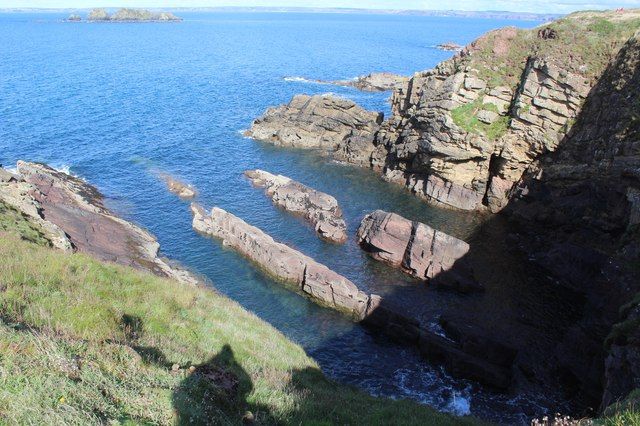 Rocky islets below cliffs
