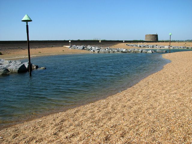 View across rock groynes and lagoons at Felixstowe Ferry beach