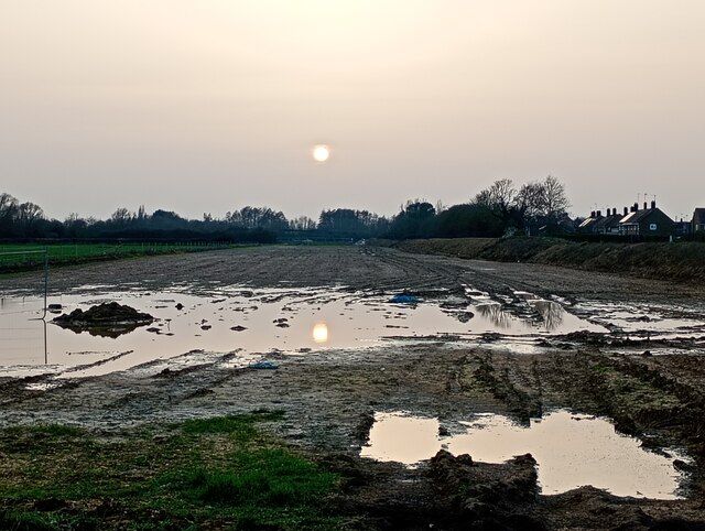Full moon reflected in a flooded field on Foxcovert Road near Peakirk