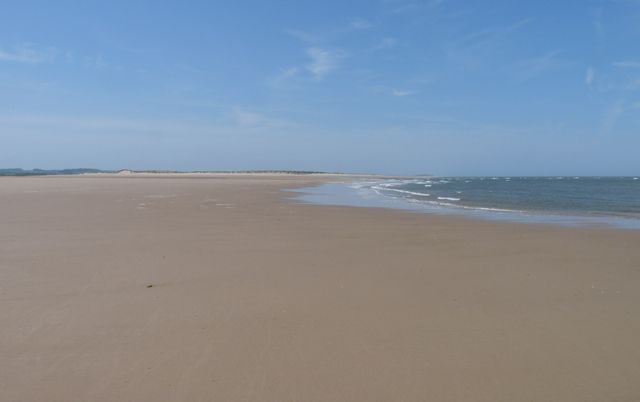 Expanses of sea, sand and sky