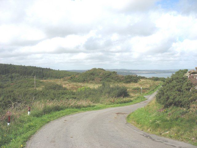 A bend in the Wern-y-Wylan road gives a glimpse of Red Wharf Bay