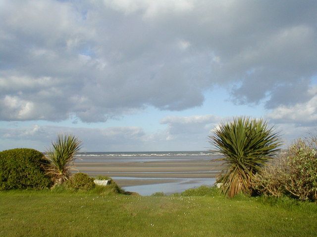 The beach from the garden of a B & B