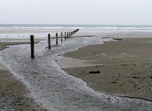 Stream discharging into the Irish Sea on the western side of Tyrella Beach