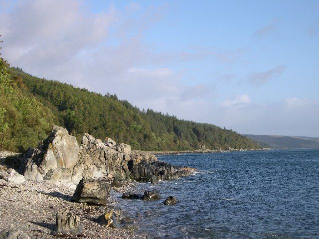 Forested hills and rocky beaches.