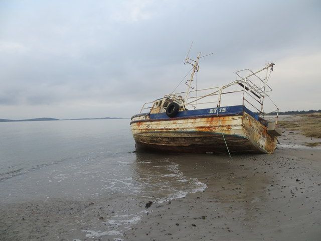 A sad sight, the Island Queen, slowly disintegrates on the beach
