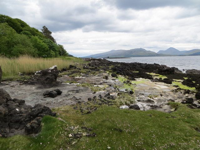 The rocky shoreline of the Sound of Mull near to Bagh Caisteal