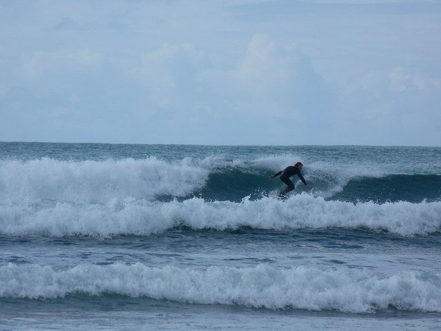 Surfing off the beach at Baile Sear