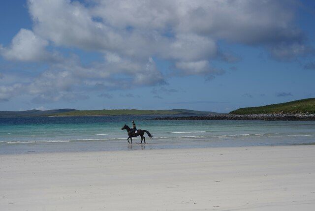 Horse and rider on Tràigh Iar