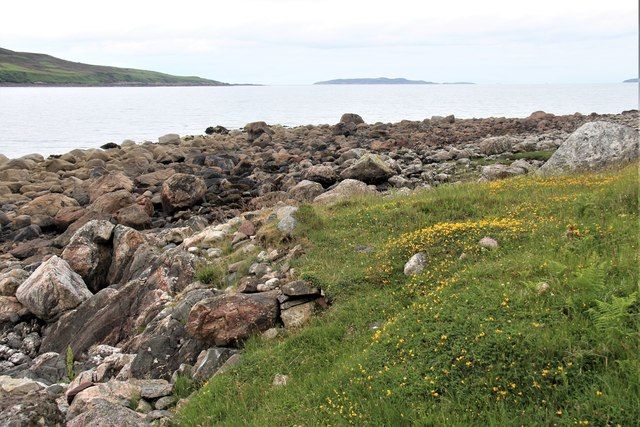 Bouldery shore opposite Gruinard Island